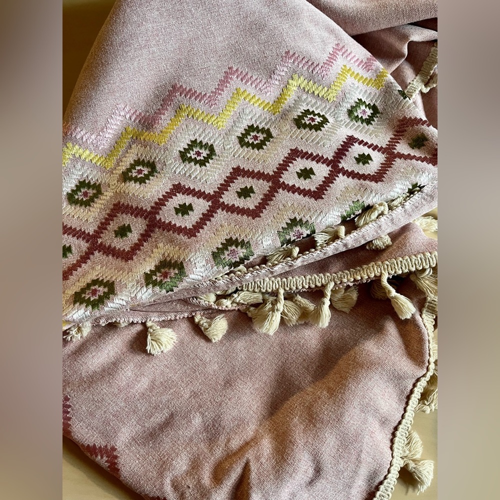 Pink, embroidered round table cloth. Used once, wash and in excellent condition